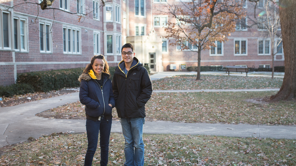 Two students standing in front of the Westlawn building
