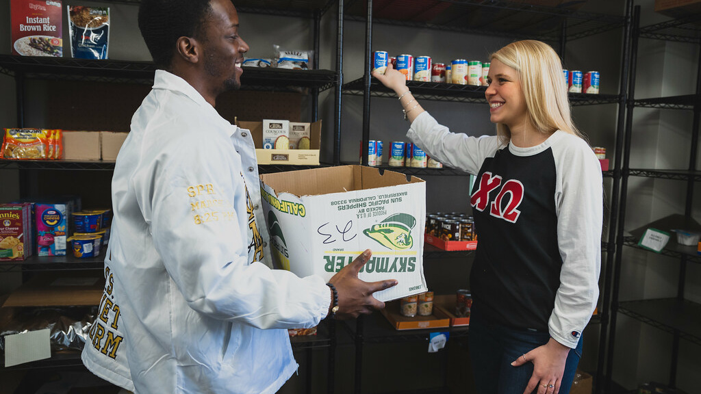 students in a food pantry